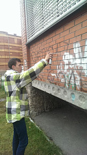 Первокурсники ФЭМГО приняли участие в общегородской акции по закраске трафаретной рекламы