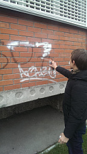 Первокурсники ФЭМГО приняли участие в общегородской акции по закраске трафаретной рекламы
