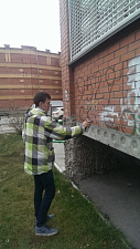 Первокурсники ФЭМГО приняли участие в общегородской акции по закраске трафаретной рекламы